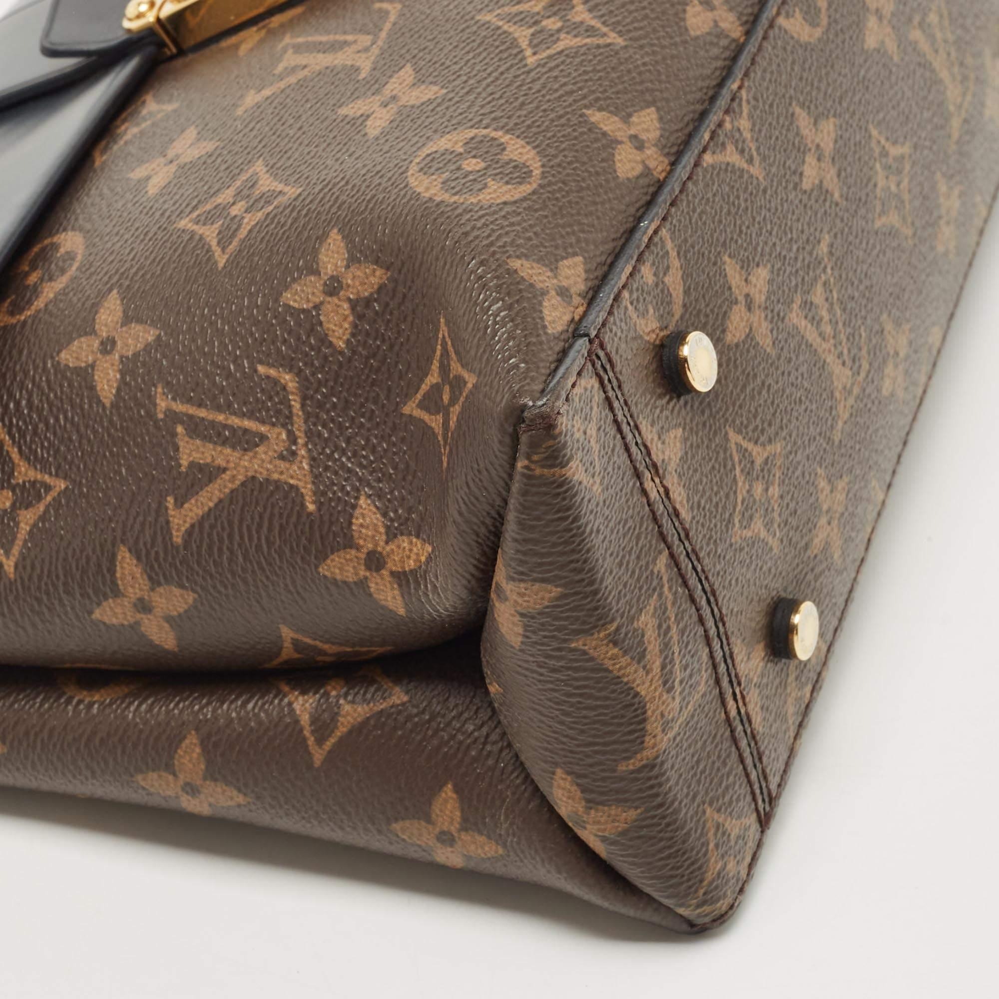 Louis Vuitton Borsa Monogram nera in tela e pelle con un manico e patta MM 9