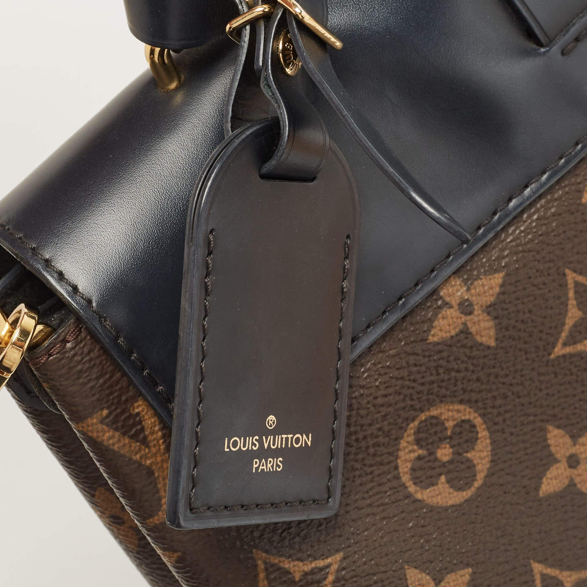 Donna Louis Vuitton Borsa Monogram nera in tela e pelle con un manico e patta MM