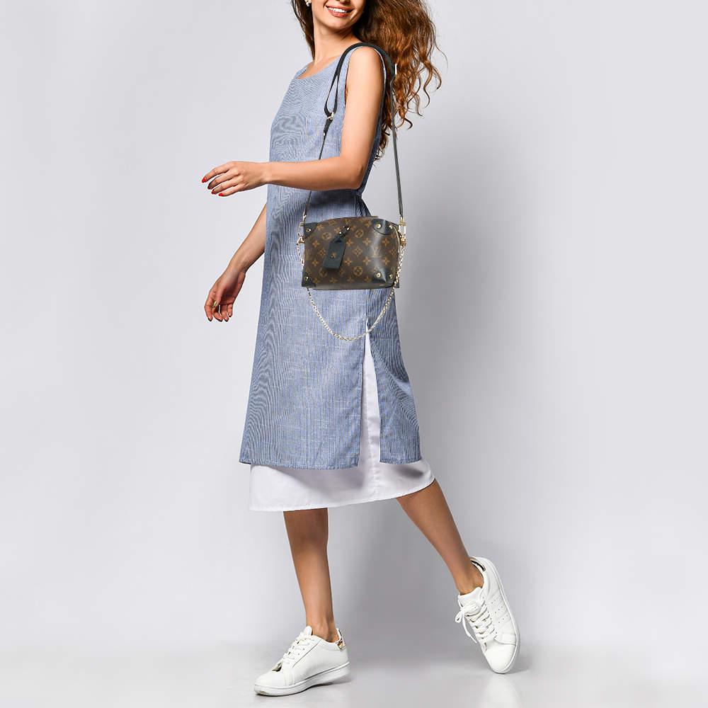Marked by flawless craftsmanship and enduring appeal  this authentic LV Petite Malle Souple bag is bound to be a versatile and durable accessory. It has a practical size.