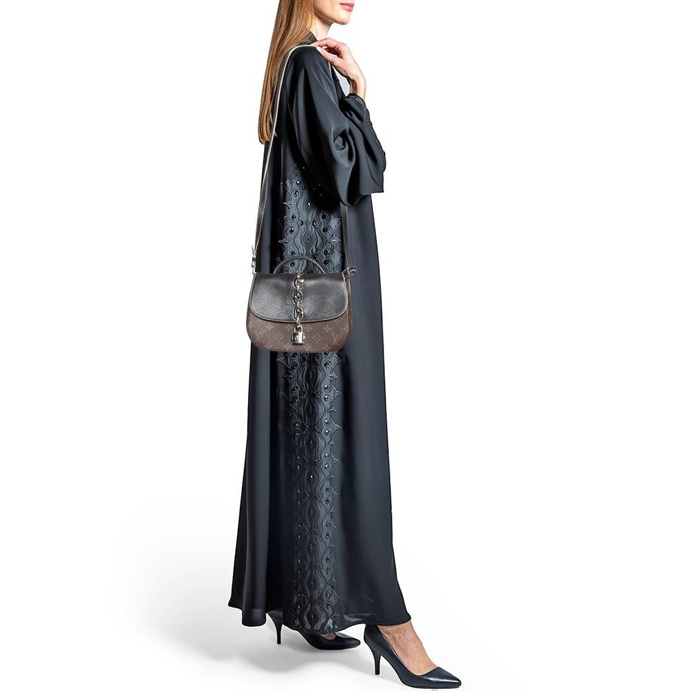 Indulge in luxury with this LV bag. Meticulously crafted from premium materials, it combines exquisite design, impeccable craftsmanship, and timeless elegance. Elevate your style with this fashion accessory.