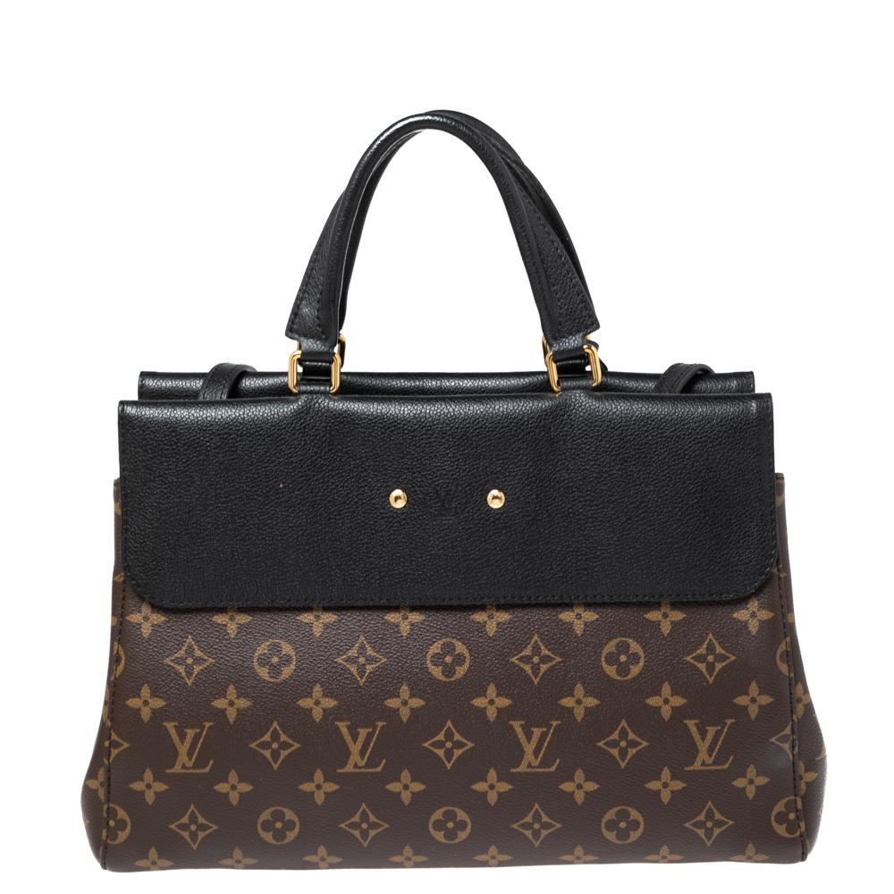 Louis Vuitton's Venus bag has a dual flap design, a top handle, and a shoulder strap. We have here the one in monogram canvas and black leather. The interior is lined with Alcantara and the metal fittings are in gold tone.

Includes: Original