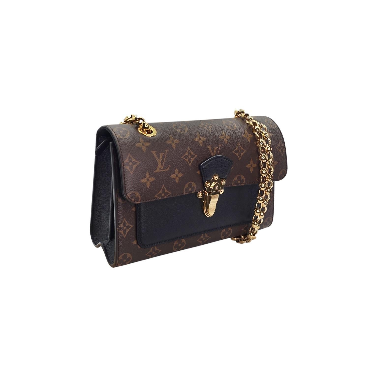 Expertly crafted from Louis Vuitton's iconic monogram coated canvas, the Monogram Victoire is a sleek and elegant bag. With a cross-over flap and polished brass bijoux chain link shoulder straps, this bag also features a facing brass press-lock and