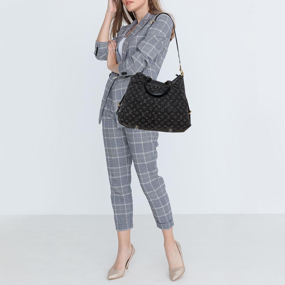 Louis Vuitton's handbags are high on style and craftsmanship, making them valuable creations of luxury. This Neo Cabby bag, like all the other handbags, is durable and stylish. Crafted from monogrammed denim, the bag comes with two leather handles.