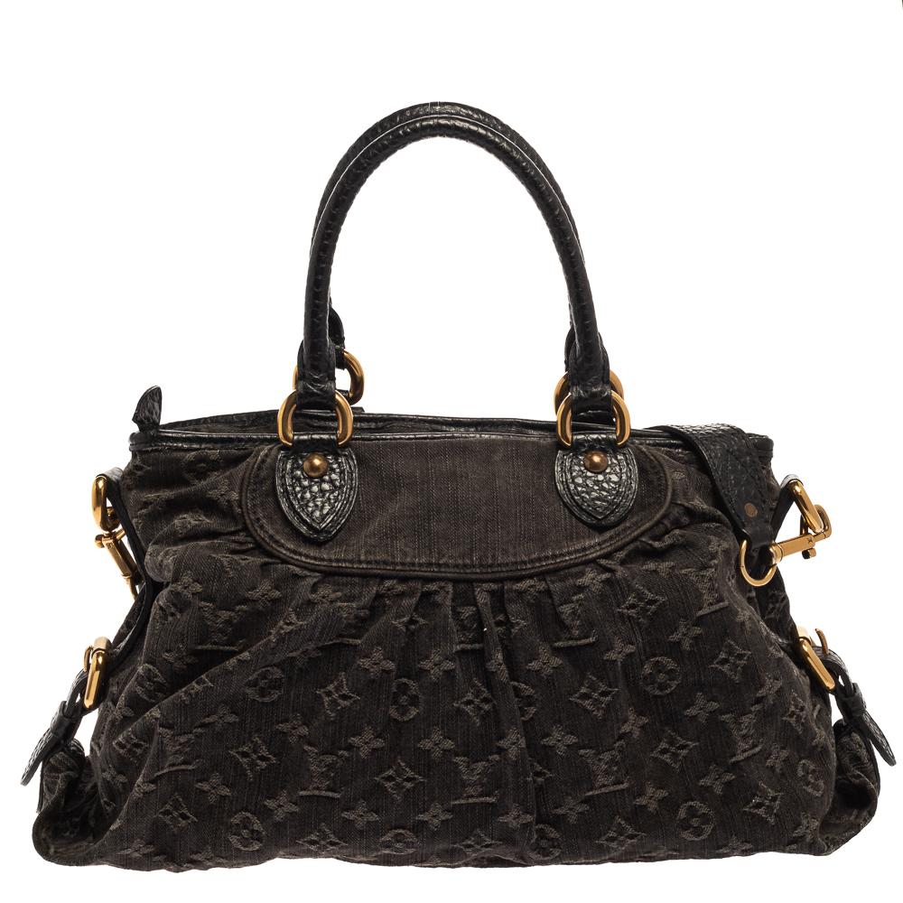 Louis Vuitton's handbags are high on style and craftsmanship, making them valuable creations of luxury. This Neo Cabby bag, like all the other handbags, is durable and stylish. Crafted from black denim and leather, the bag comes with two leather
