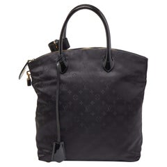 Louis Vuitton Borsa Monogram Desire Vertical Lockit MM nera