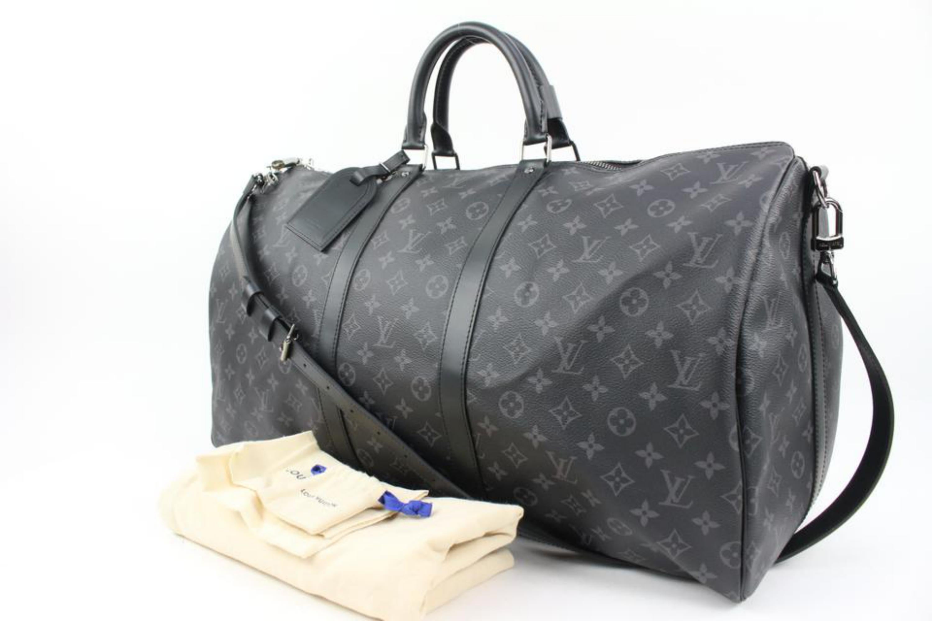Louis Vuitton Black Monogram Eclipse Keepall Bandouliere 55 Duffle Bag Strap 39L0V
Date Code/Serial Number: DU2179
Made In: France
Measurements: Length:  22