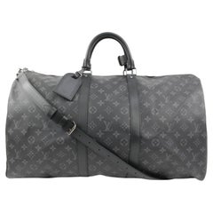 Louis Vuitton - Sac à bandoulière « Keepall » à monogramme noir « Eclipse » avec sangle, 39L