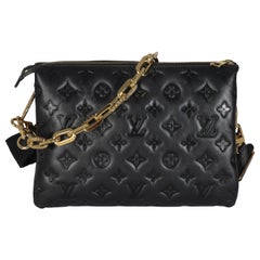 Louis Vuitton PM in pelle d'agnello con Monogram nero in rilievo