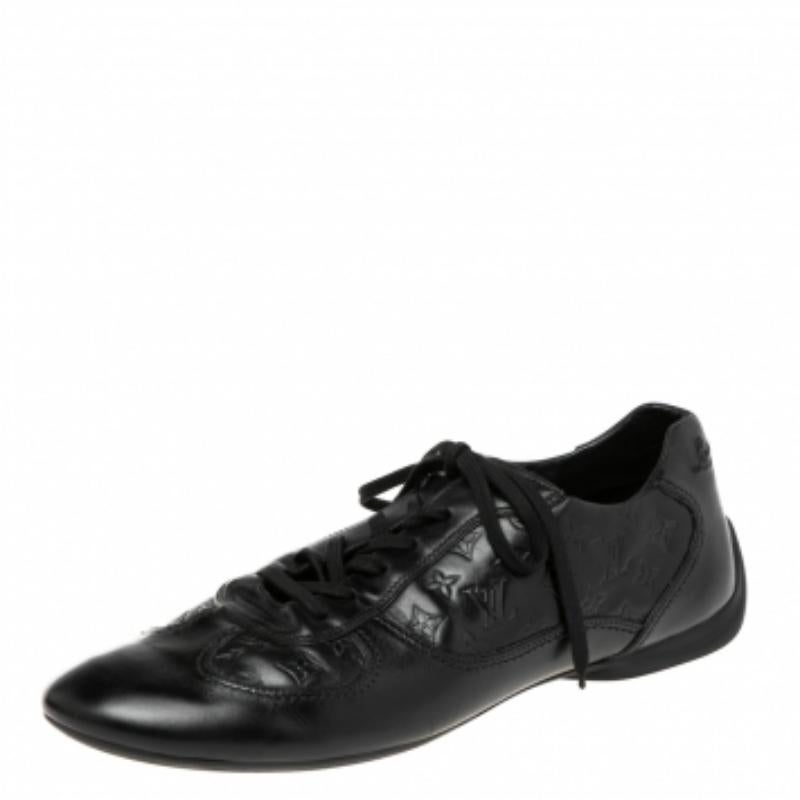 These sneakers from the House of Louis Vuitton are designed to offer never-ending elegance and luxury to your appearance! They are made from black Monogram-embossed leather on the exterior and showcase lace-ups on the vamps. Their structure is made