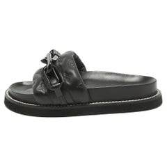 Louis Vuitton Schwarze Monogramm geprägte LV Sunset Slides aus Leder mit Monogramm LV Größe 37