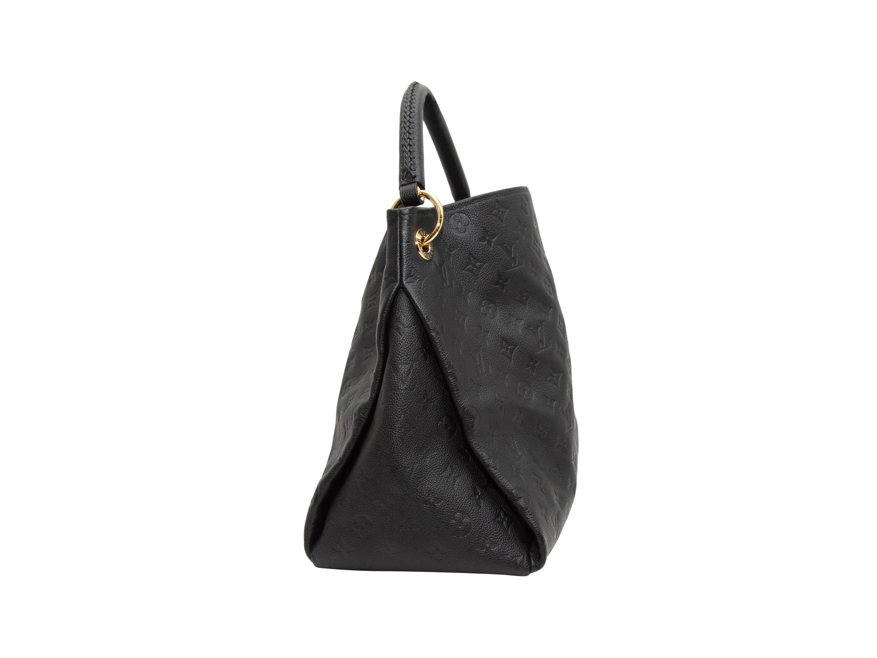 Product details: Black Monogram Empreinte Leather Artsy MM bag by Louis Vuitton. Gold-tone hardware. Single handle strap. 16