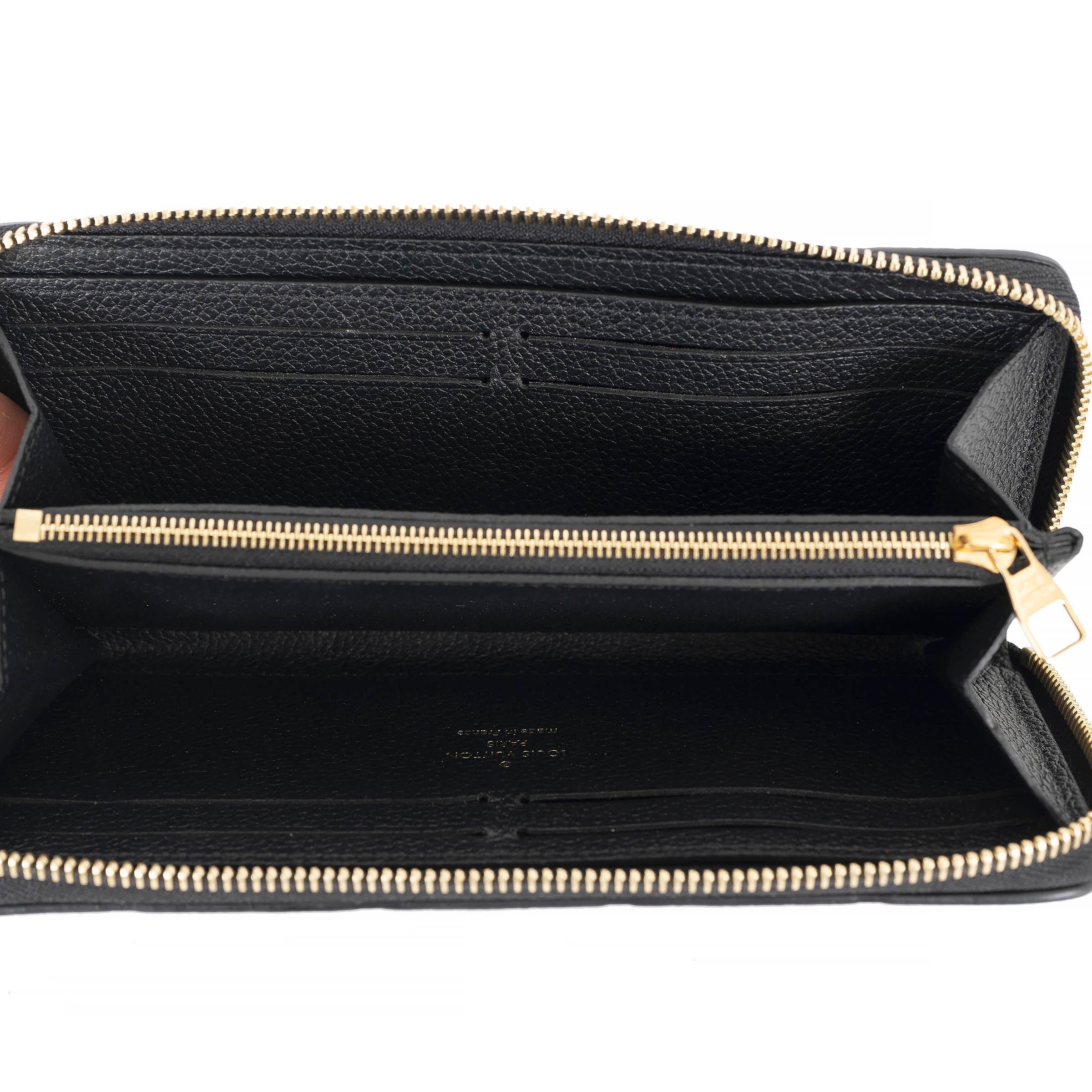 Women's LOUIS VUITTON black Monogram Empreinte leather CLEMENCE Wallet For Sale