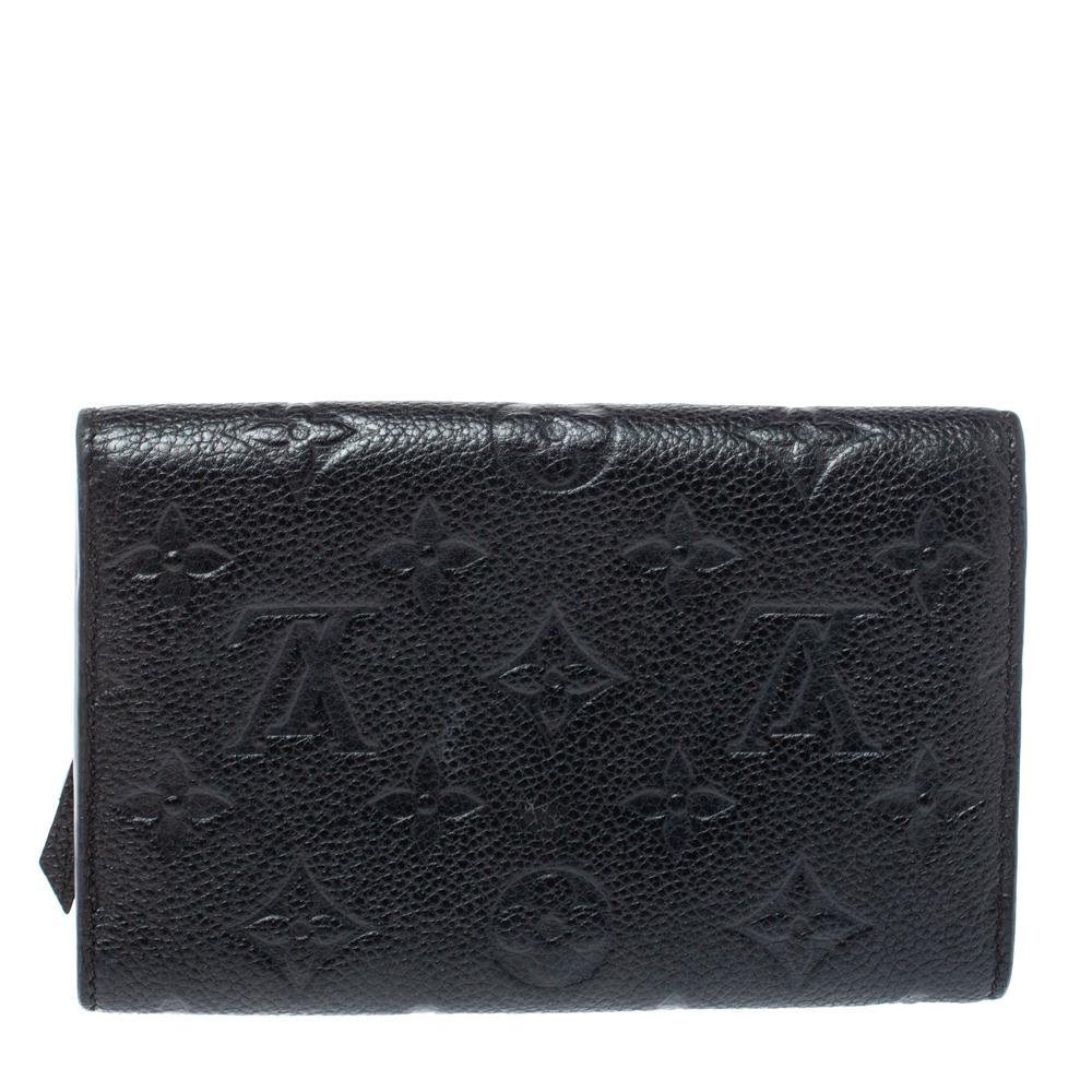 Stylish wallets are a closet must-have! This black-hued wallet from Louis Vuitton is styled like an envelope and is crafted from Empreinte leather. This sleek wallet comes with multiple slots and compartments. It is perfect for daily use. Grab it