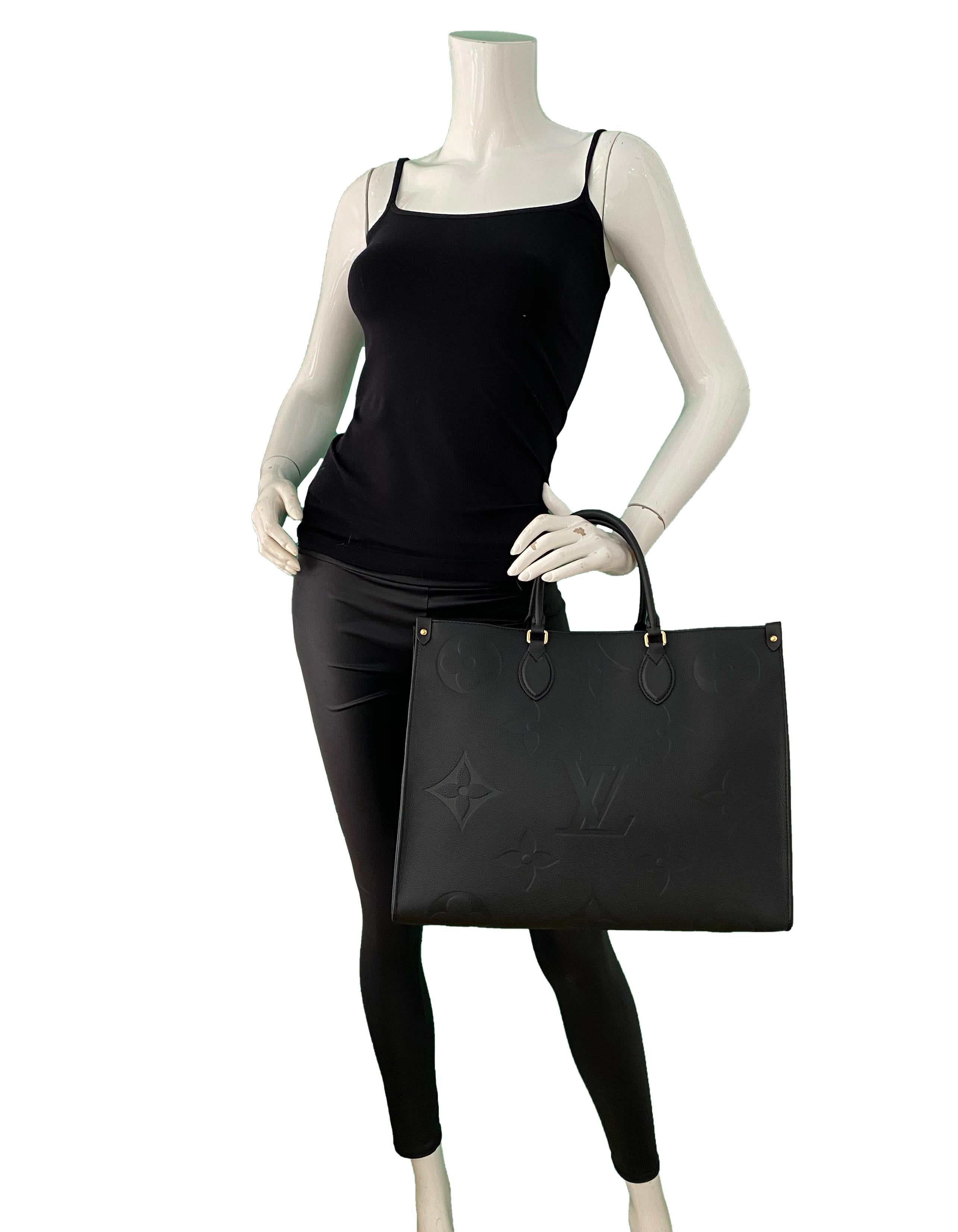 Louis Vuitton Black Monogram Empreinte Leather Giant Onthego GM Tote Bag. M44925.

Made In: France
Year of Production: 2020
Color: Black
Hardware: Goldtone
Materials: Cowhide leather
Lining: Microfiber
Closure/Opening: Open with center hook
Interior