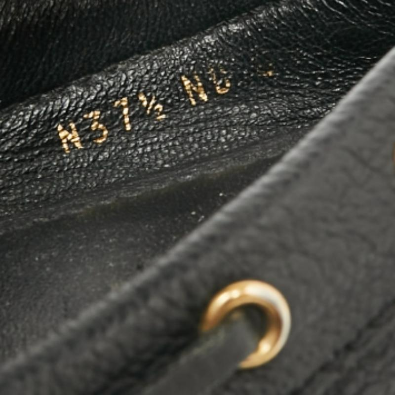 These Gloria loafers by Louis Vuitton are stylish and comfortable. Made from Monogram Empreinte leather, they feature knotted bows with gold-tone eyelets. They come with pebbled rubber soles and counters. The insoles are leather lined and carry the