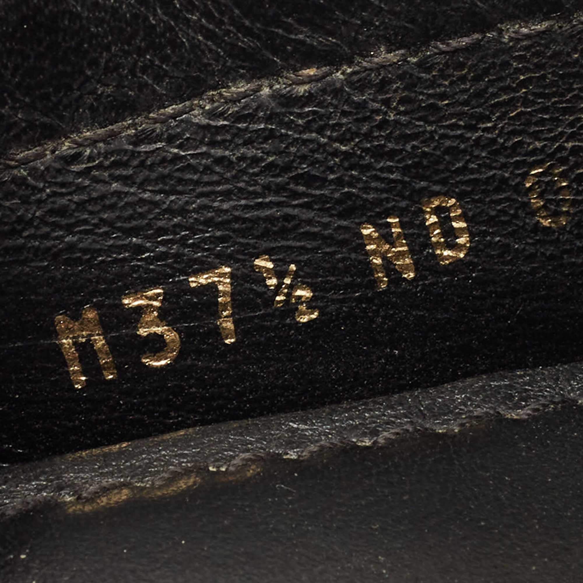 Louis Vuitton Black Monogram Empreinte Leather Gloria Loafers Size 37.5 For Sale 3