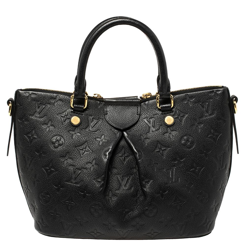 The Mazarine from Louis Vuitton's 2016 Cruise collection is a luxurious everyday bag. Crafted from black-hued Monogram Empreinte leather, this gorgeous number has a spacious canvas interior. It features two handles, a shoulder strap, and protective