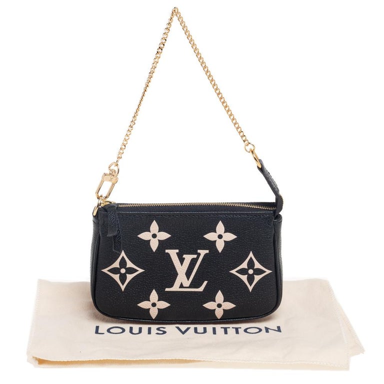 LOUIS VUITTON Mini Pochette Accessoires Monogram Empreinte Leather