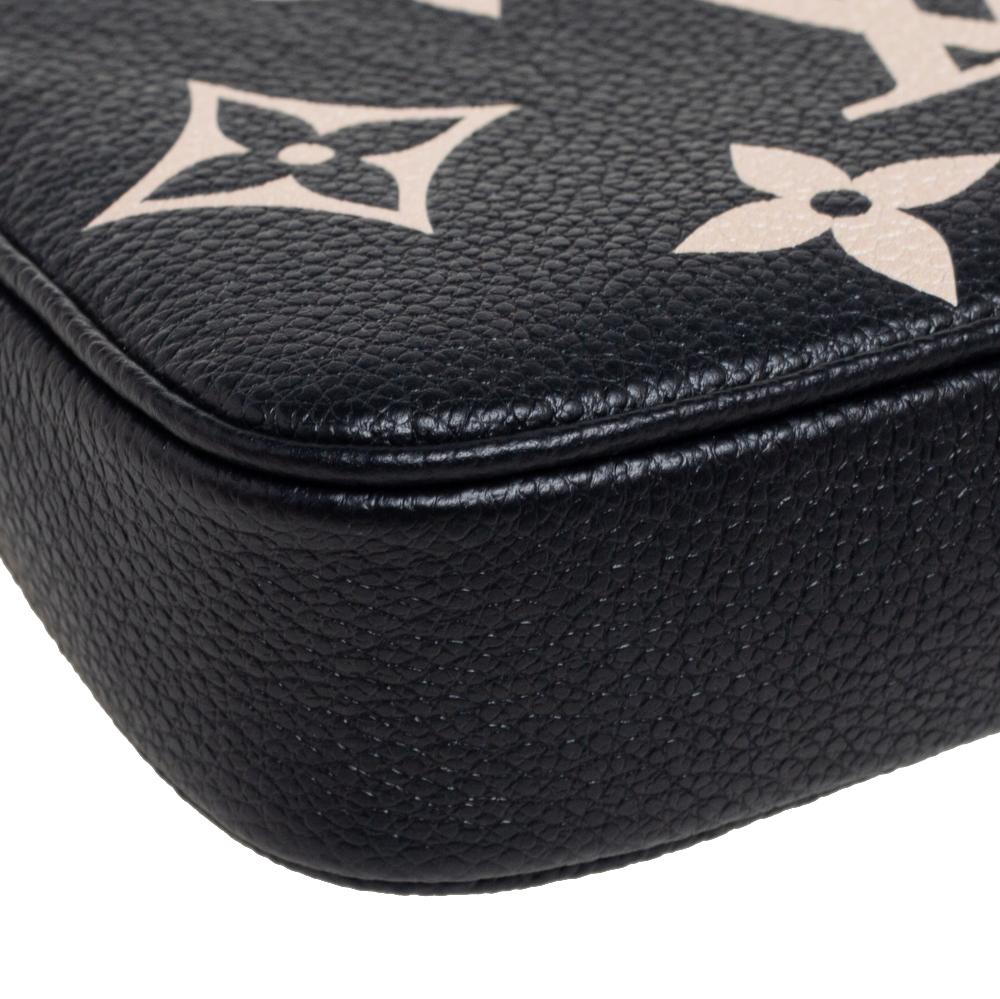 Women's Louis Vuitton Black Monogram Empreinte Leather Mini Pochette Accessoires