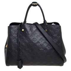 Louis Vuitton - Sac Montaigne MM en cuir noir avec monogramme Empreinte
