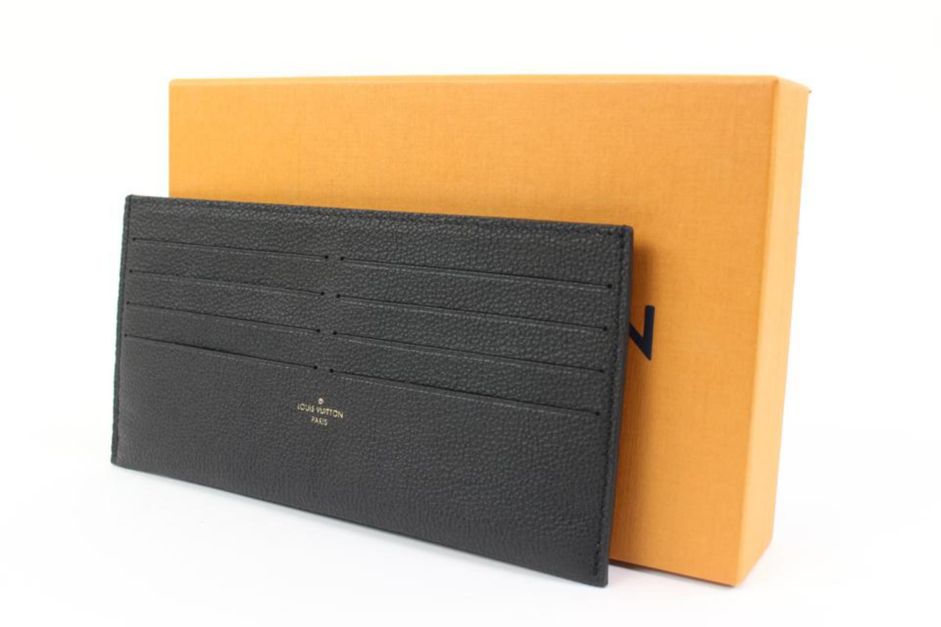 Louis Vuitton Black Monogram Empreinte Long Card Holder Felicie Insert 34lv217s
Date Code/Serial Number: RFID Chip
Measurements: Length:  7.5