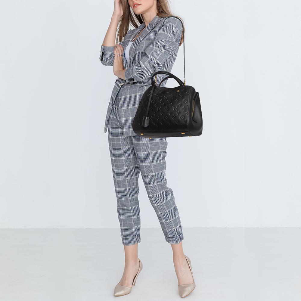 Louis Vuitton's handbags are popular owing to their high style and functionality. This bag, like all their designs, is durable and stylish. Exuding fine finish, the bag is designed to give a luxurious experience. The interior has enough space to