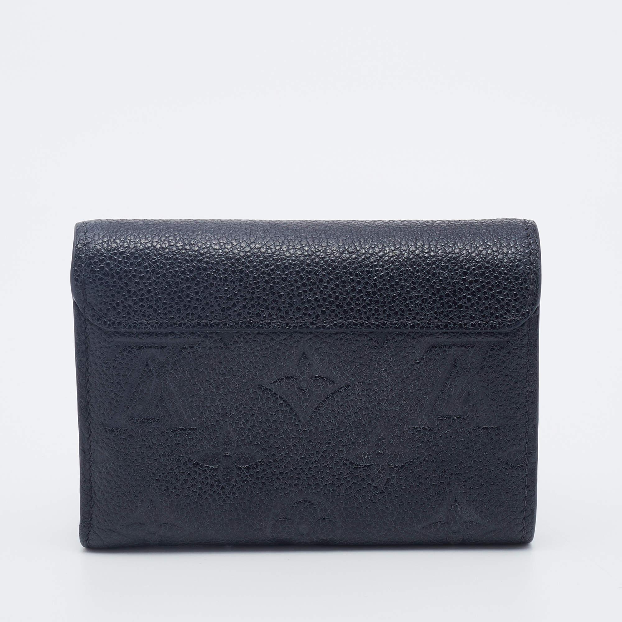 This compact wallet from Louis Vuitton will surely fetch you a lot of compliments. Designed using Monogram Empreinte Pont Neuf leather, this wallet has gold-tone fittings and a spacious interior. Elegance meets style effortlessly when you team up