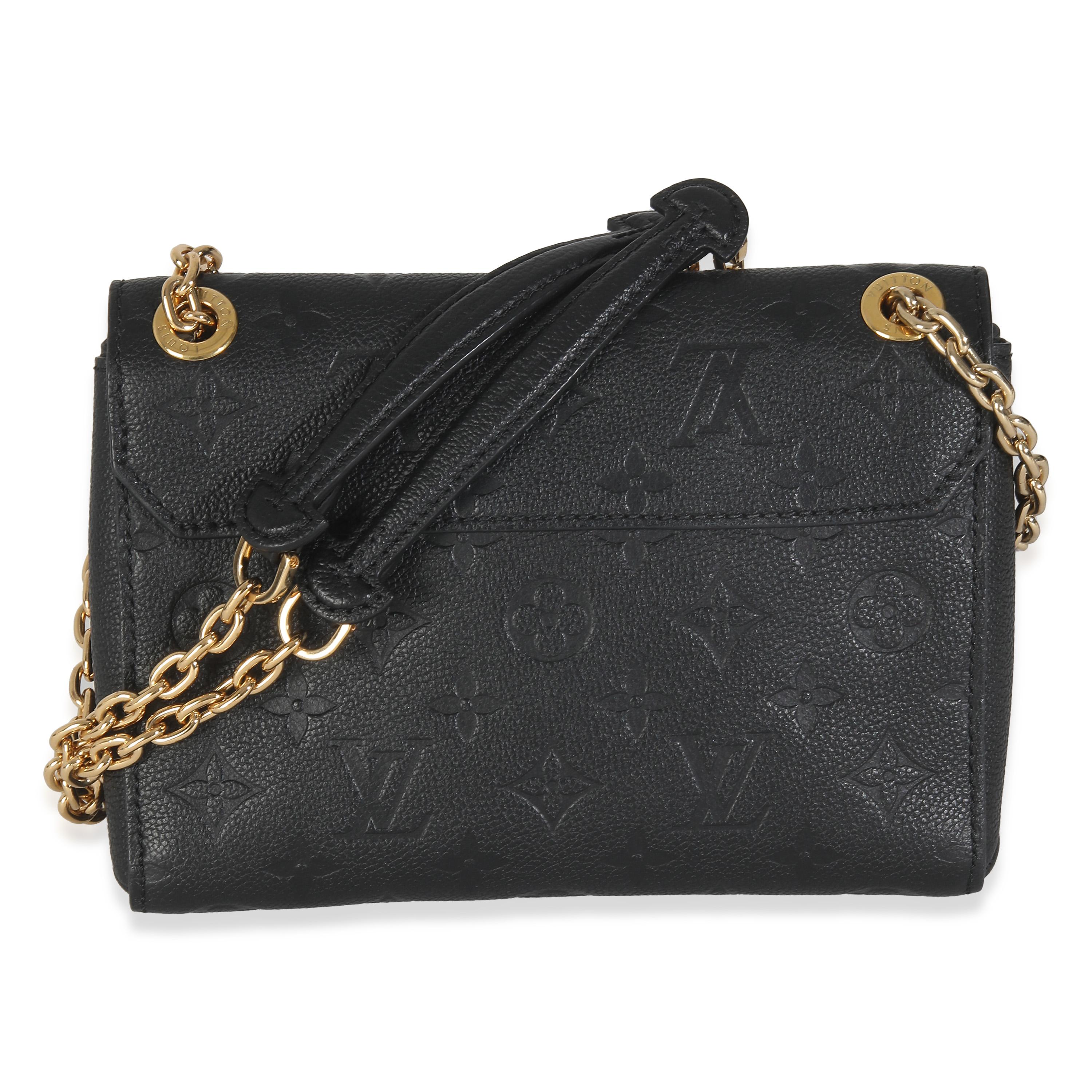 Listing Title: Louis Vuitton Black Monogram Empreinte Vavin BB
SKU: 146198
Condition: Pre-owned 
Handbag Condition: Very Good
Condition Comments: Item is in very good condition with minor signs of wear. Faint corner wear. Scratching and tarnishing