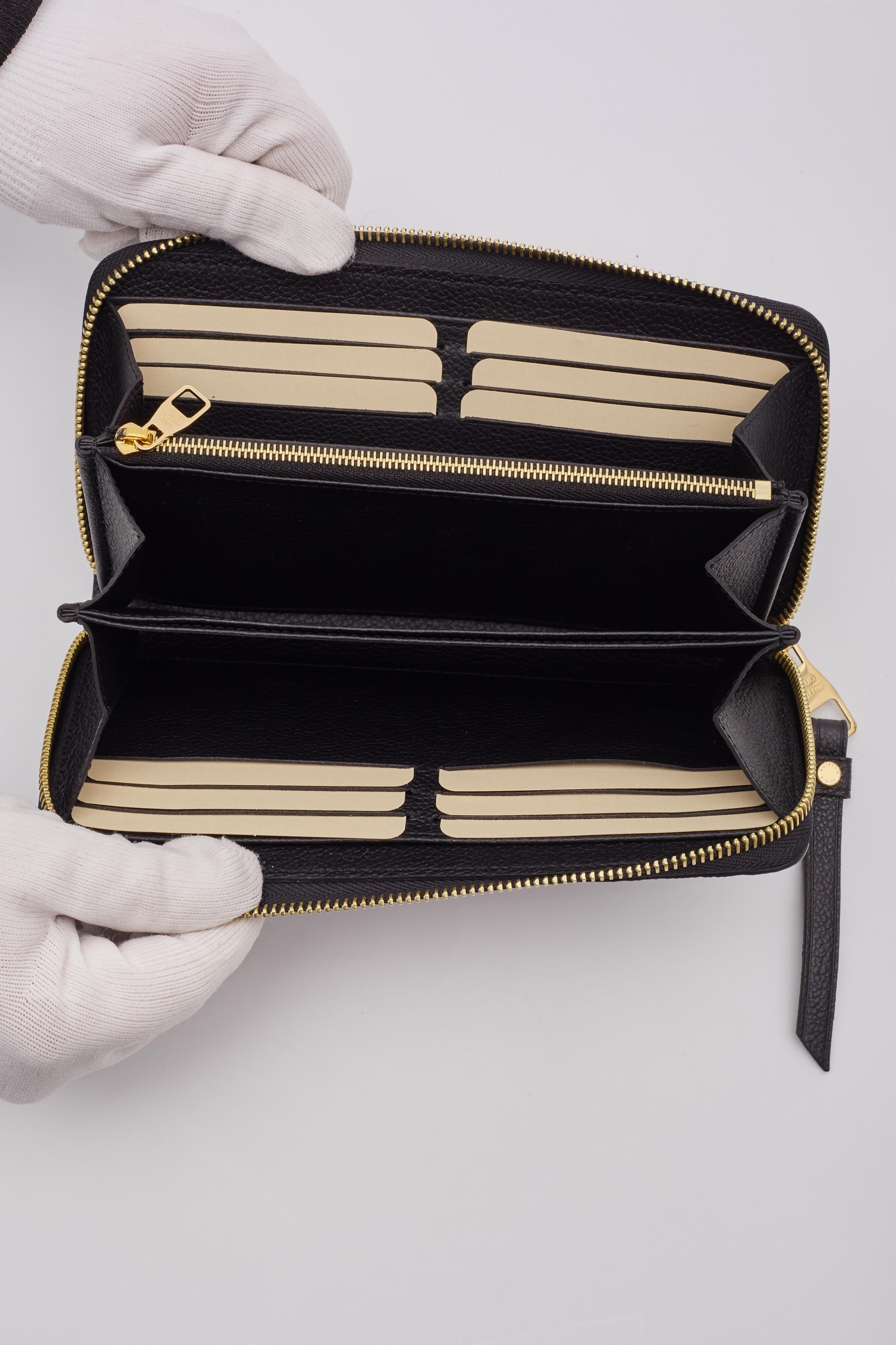 Women's or Men's Louis Vuitton Black Monogram Empreinte Zippy Wallet For Sale