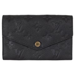 LOUIS VUITTON Portefeuille VICTORINE en cuir Emrpeinte Monogram noir