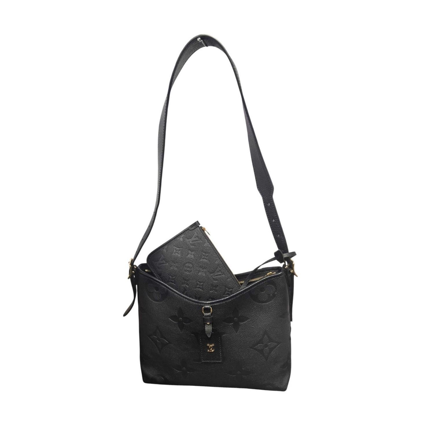 Indulge in luxury with the Louis Vuitton Black Monogram Giant CarryAll PM. Crafted from supple, grained leather and detailed with gold-tone hardware, this designer bag exudes elegance and sophistication. The spacious interior, zip closure, and