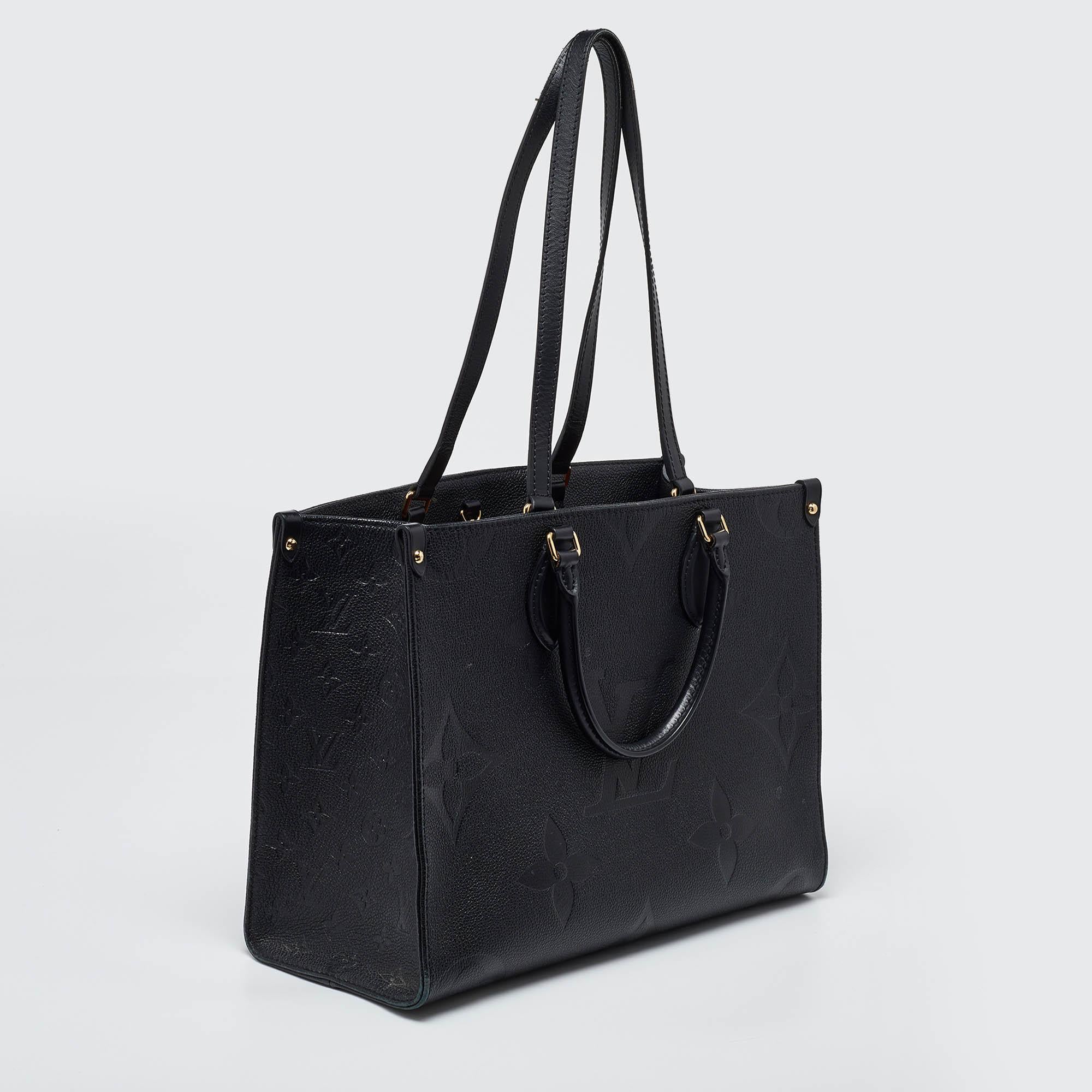 Louis Vuitton Black Monogram Giant Empreinte Leather Onthego MM Bag In Good Condition For Sale In Dubai, Al Qouz 2