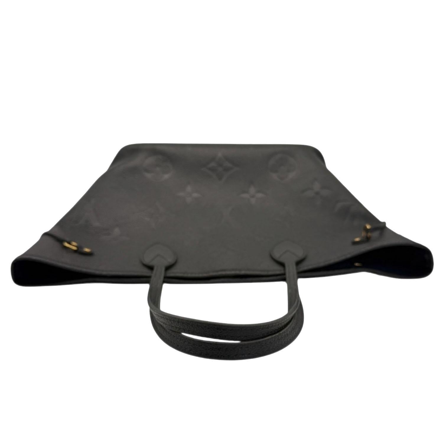 Louis Vuitton Black Monogram Giant Empreinte Neverfull MM For Sale 1