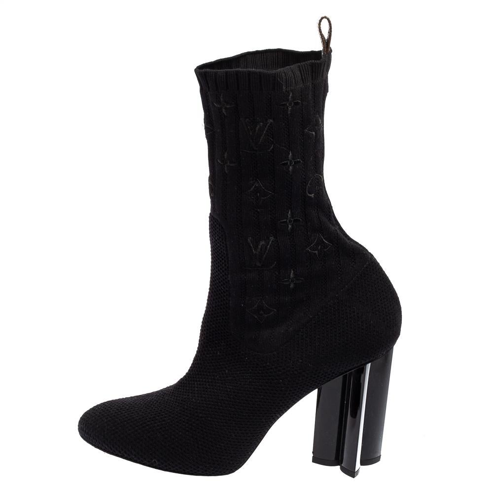 How can one not be in love with these boots from Louis Vuitton! Crafted from monogram knit fabric and styled in a sock design, these boots are on-point with style. They come with almond toes and heels with monogram motifs. These boots are just