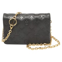Louis Vuitton Coussin Pochette-Tasche aus Leder mit schwarzem Monogramm