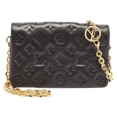 Louis Vuitton Coussin Pochette-Tasche aus Leder mit schwarzem Monogramm