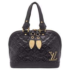 Louis Vuitton Double Jeu Neo Alma Tasche aus schwarzem Leder mit Monogramm