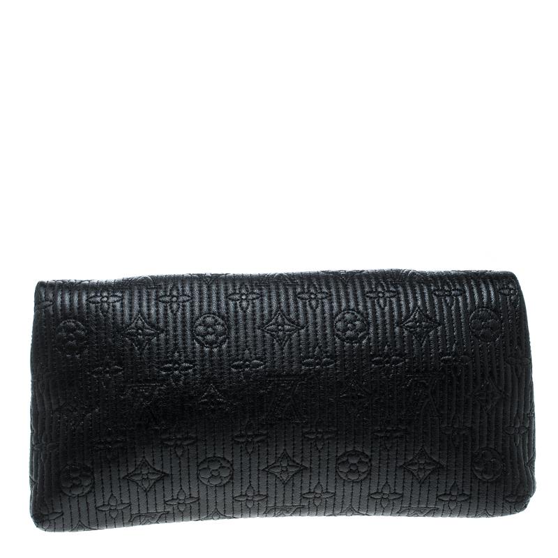 This Altair clutch by Louis Vuitton is utterly desirable! The limited edition bag is overflowing with style and has a black monogram leather exterior. The twist lock closure opens to a well sized interior and this chic creation will lift all your