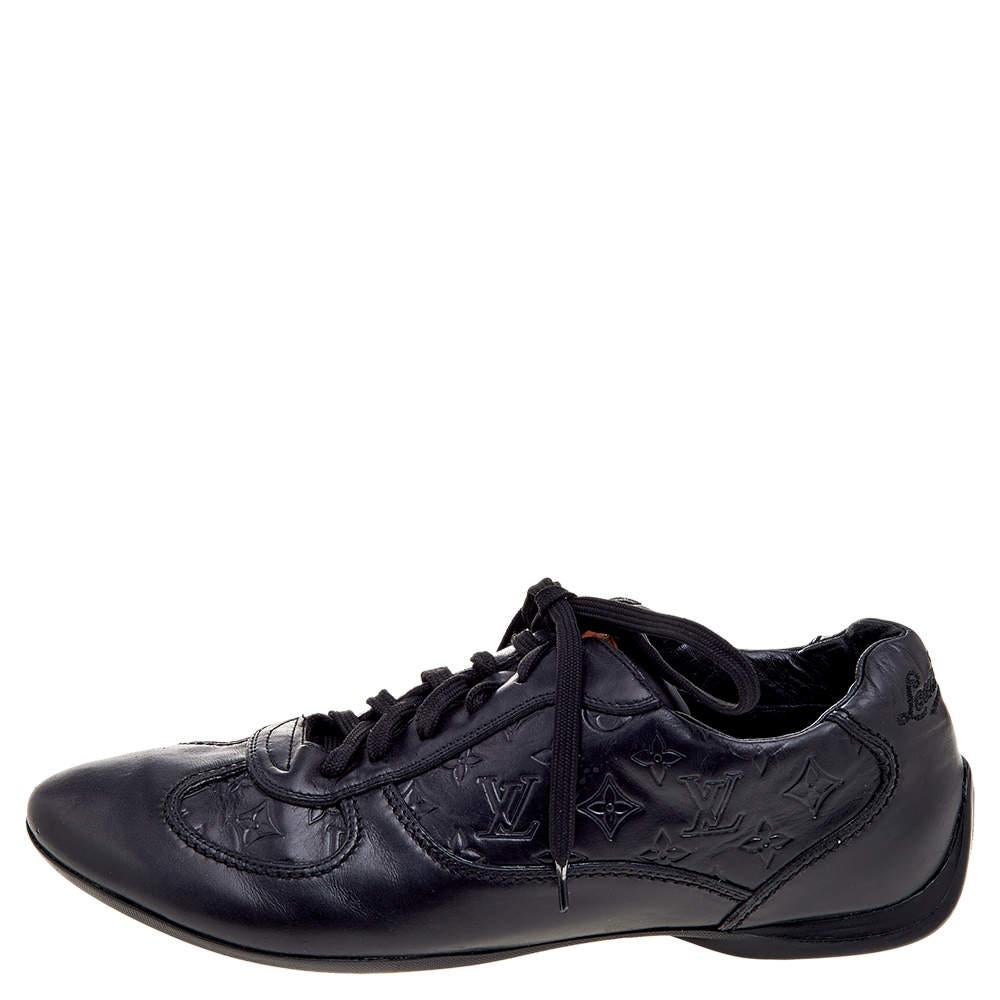 The House of Louis Vuitton, with its classy aesthetic and precise structuring, has created these sneakers. They are designed using black Monogram leather into a low-top silhouette. Their vamps come with a lace-up closure. Complement your casual