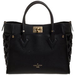 Louis Vuitton - Sac en cuir noir Monogramme Tuff On My Side