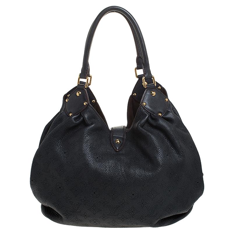 Louis Vuitton bags are on the wishlist of every fashionista and this bag from the house is a delight to own. Designed using Mahina leather, this bag features a slightly slouchy silhouette and gold-tone hardware. It comes with dual rolled top handles