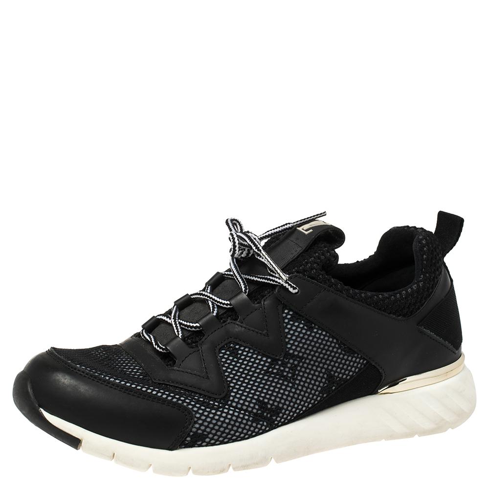 Get your hands on these perfect urban sneakers from the house of Louis Vuitton that have been made in Italy. Crafted from black monogram mesh and leather, these Aftergame sneakers have laces on the vamps and tough rubber soles for durability. Pair