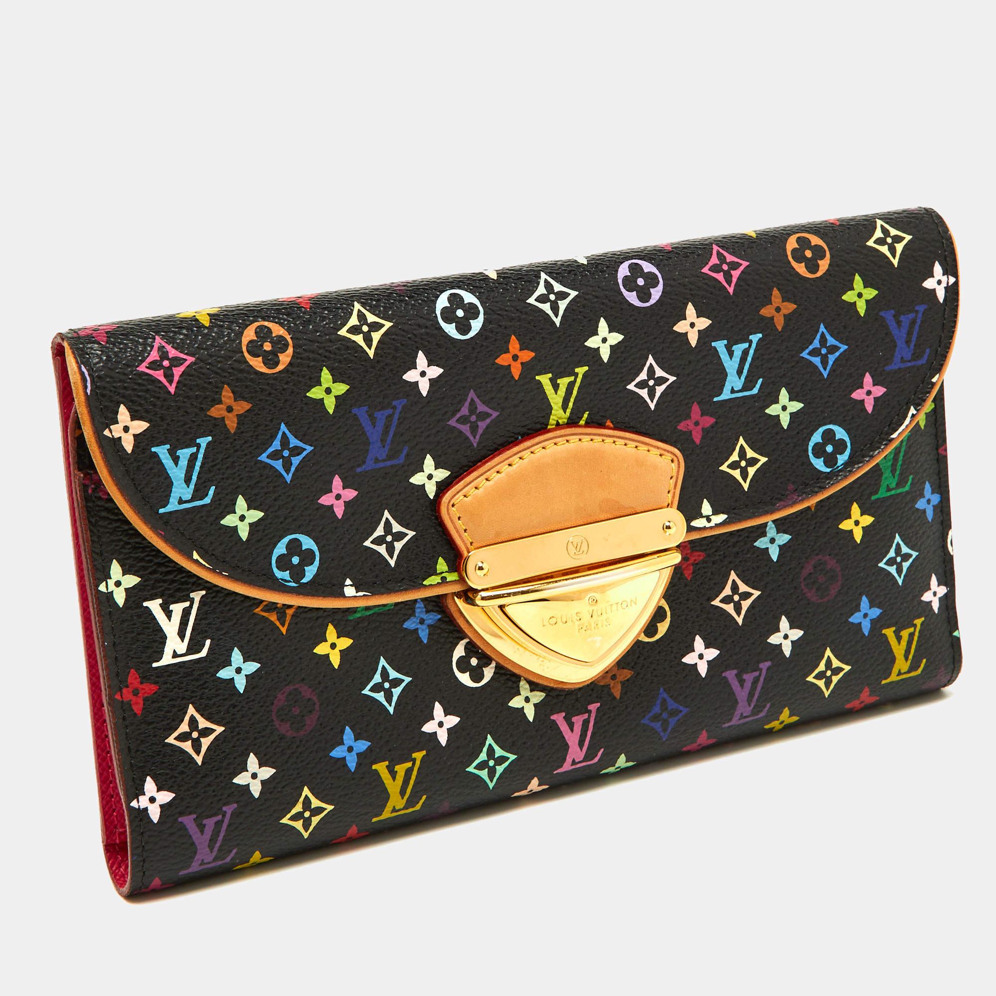 Stylish wallets are a closet must-have! This Eugenie wallet from the house of Louis Vuitton has been crafted from Multicolore Monogram canvas in France. It has been styled as a trifold with a push-lock flap that opens up to a leather interior