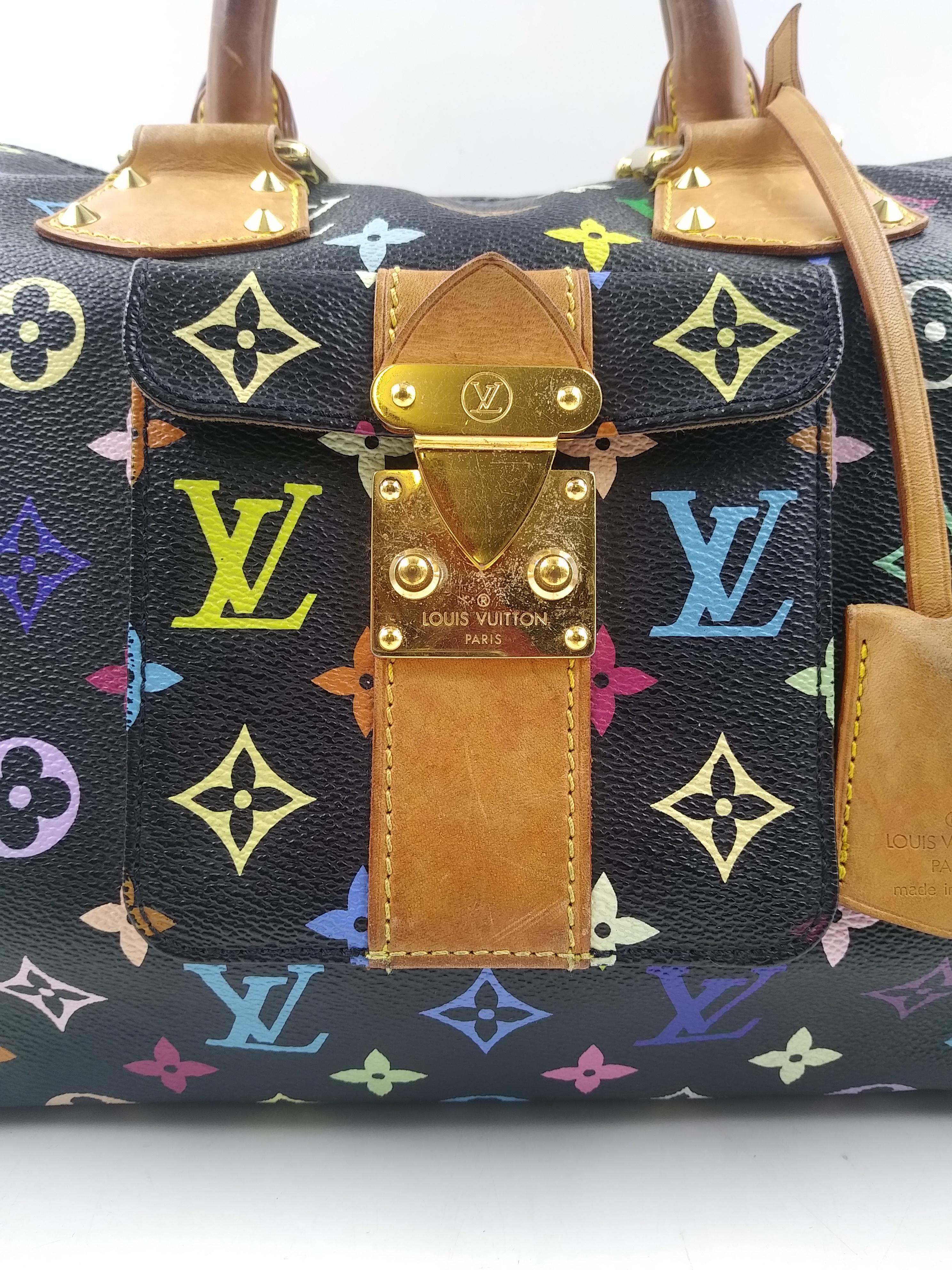 Louis Vuitton Schwarzes Monogramm Multicolor Speedy 30 Tasche, 2004
- 100% authentisch Louis Vuitton
- Schwarzes Multicolor beschichtetes Segeltuch mit Vachetta-Leder
- Einfacher Reißverschluss
- Eine Außentasche mit S-Lock-Schnalle 
- Doppelt