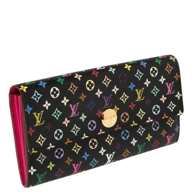One of the most famous wallets by Louis Vuitton is the Sarah. This one is crafted from Monogram Multicolore canvas and the button on the flap opens to an interior with multiple card slots and a zip pocket. Perfect in size, this wallet can easily fit