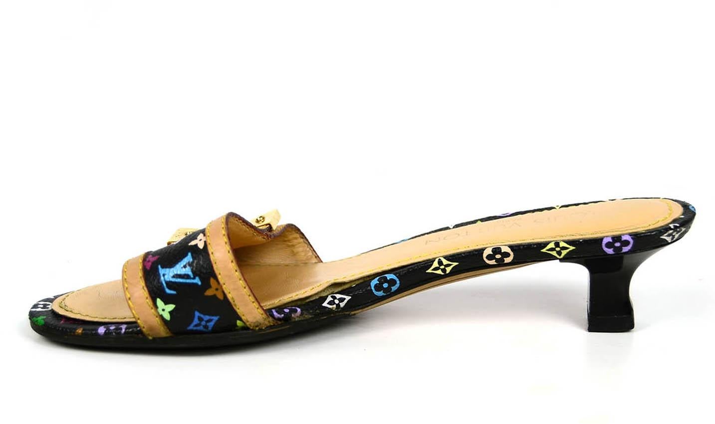 Louis Vuitton Black Monogram Multicolore Open-Toe Mules sz 37.5

Made In: Italy
Color: Black with multicolor monogram
Hardware: Goldtone
Materials: Coated canvas and vachetta leather
Closure/Opening: Slide on
Overall Condition: Excellent pre-owned