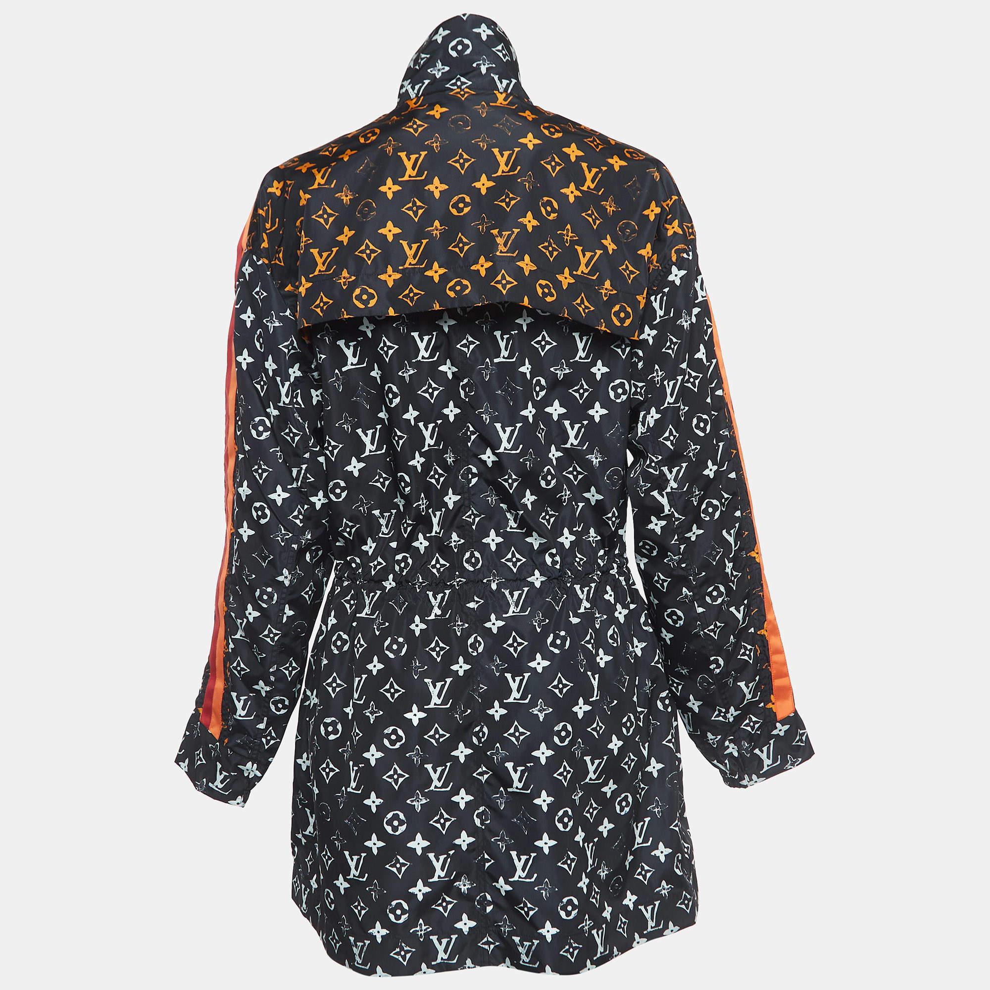The Louis Vuitton jacket exudes luxury with its iconic monogram pattern. Crafted from high-quality nylon, it features a stylish zip front, offering a contemporary and sophisticated aesthetic for the fashion-forward individual.

