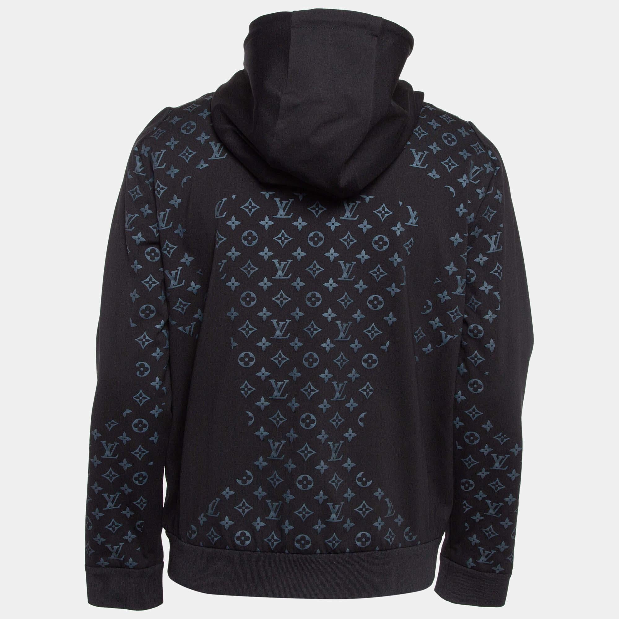 This black hoodie from Louis Vuitton is for men. Made of jersey fabric it has 2 pockets a drawstring hood and the classic Monogram print on the exterior.