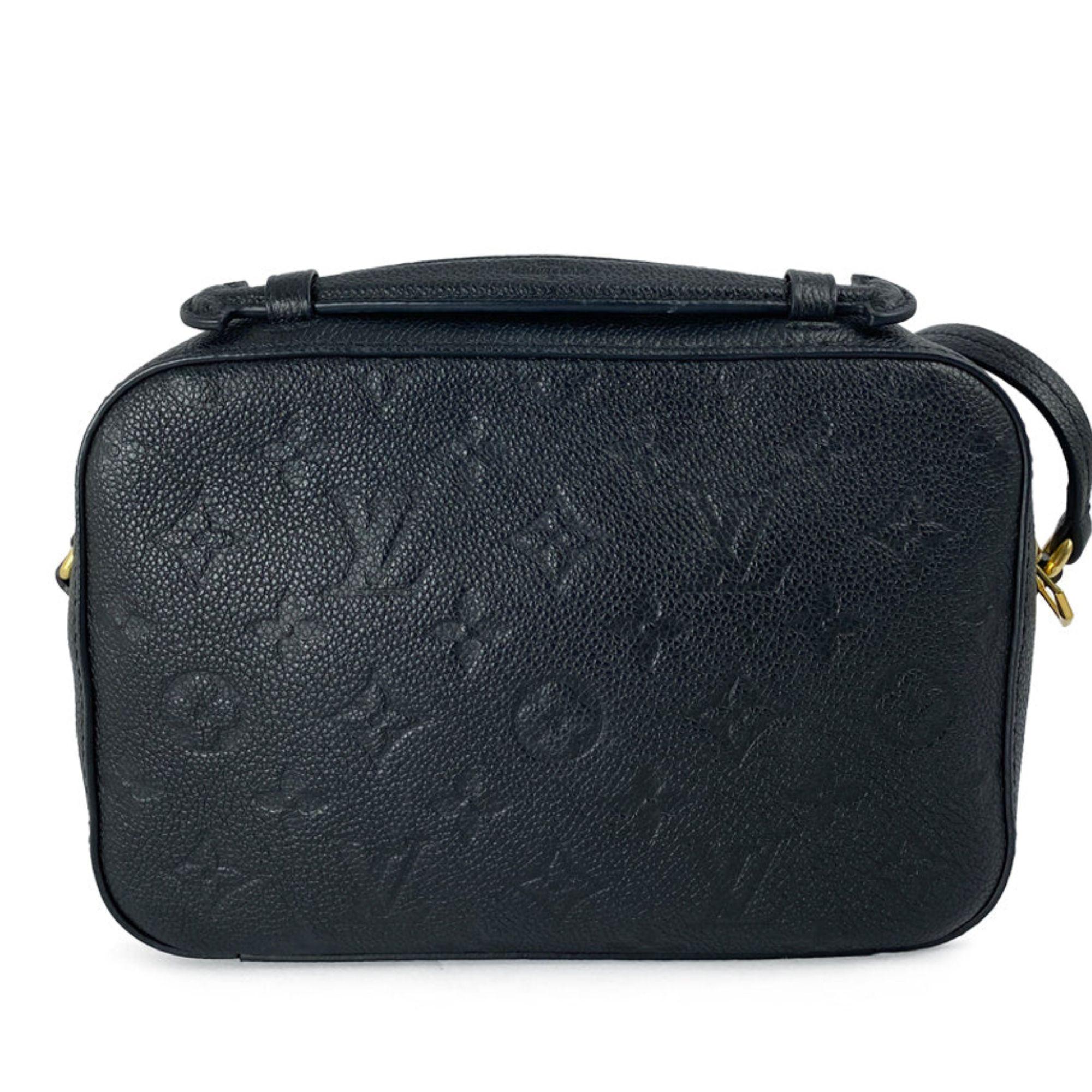 Black leather monogram embossed Louis Vuitton  Saintonge crossbody bag with logo plaque and tassel detail. Includes one slide pocket.

Measurements:
Height: 14cm
Width: 22cm
Depth: 7cm
Handle Drop: 6cm
Overall condition: excellent 
Interior