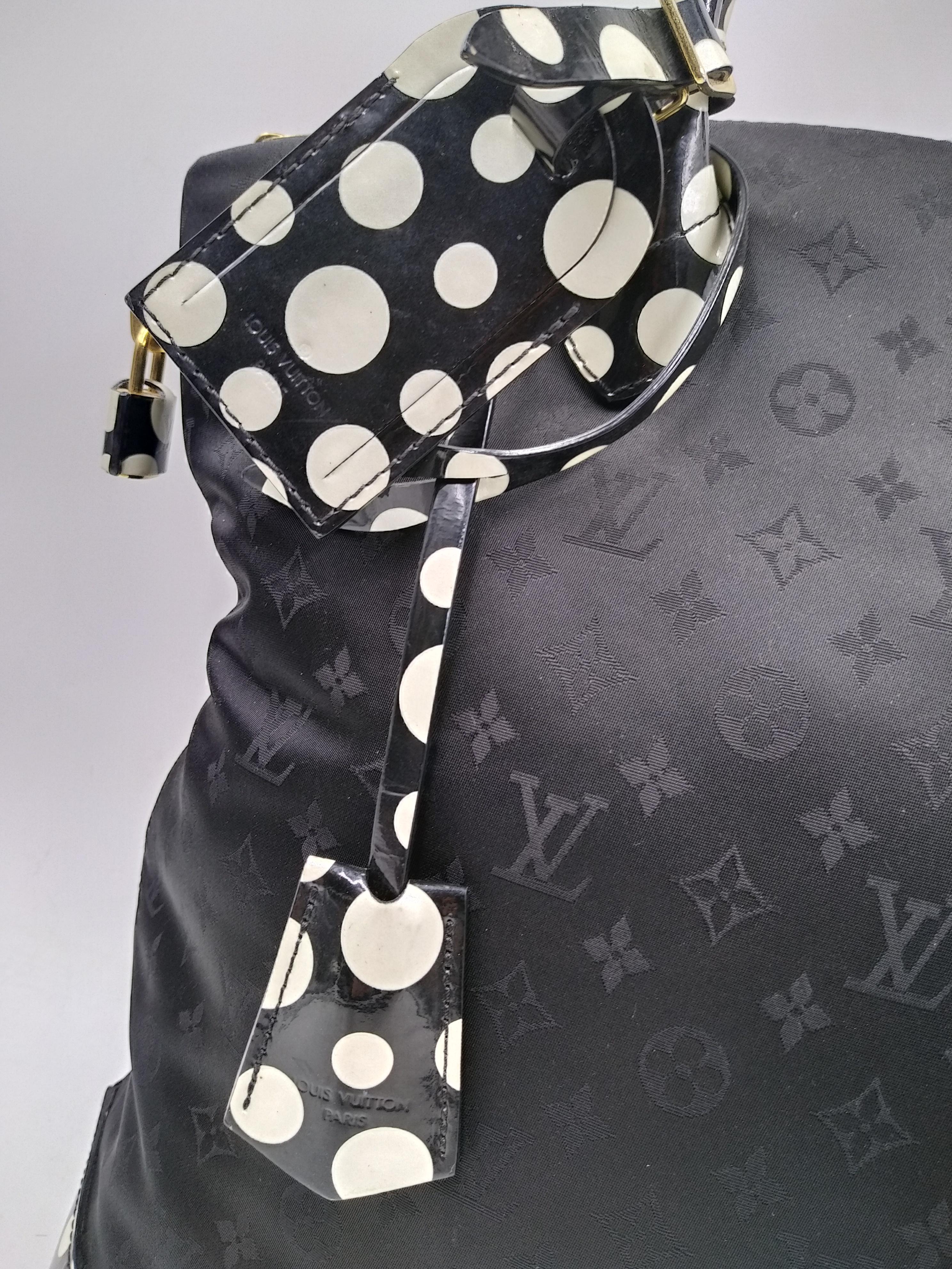 Louis Vuitton Black Monogram Satin Yayoi Kusama Dots Infinity Lockit Vertical MM Bag, limited edition 2012
- 100% authenitic Louis Vuitton;
- monogram nylon body
- rolled leather handles
- zip closure on the top 
- interior zip pocket
